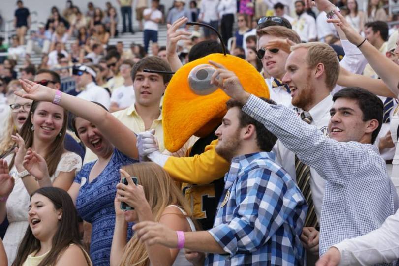 Buzz, the mascot for Georgia Tech, hands out with Yellow Jacket fans during their game with Tulane on Sept. 12, 2015, in Atlanta, GA. (RoadTripSports photo by Chuck Cox)